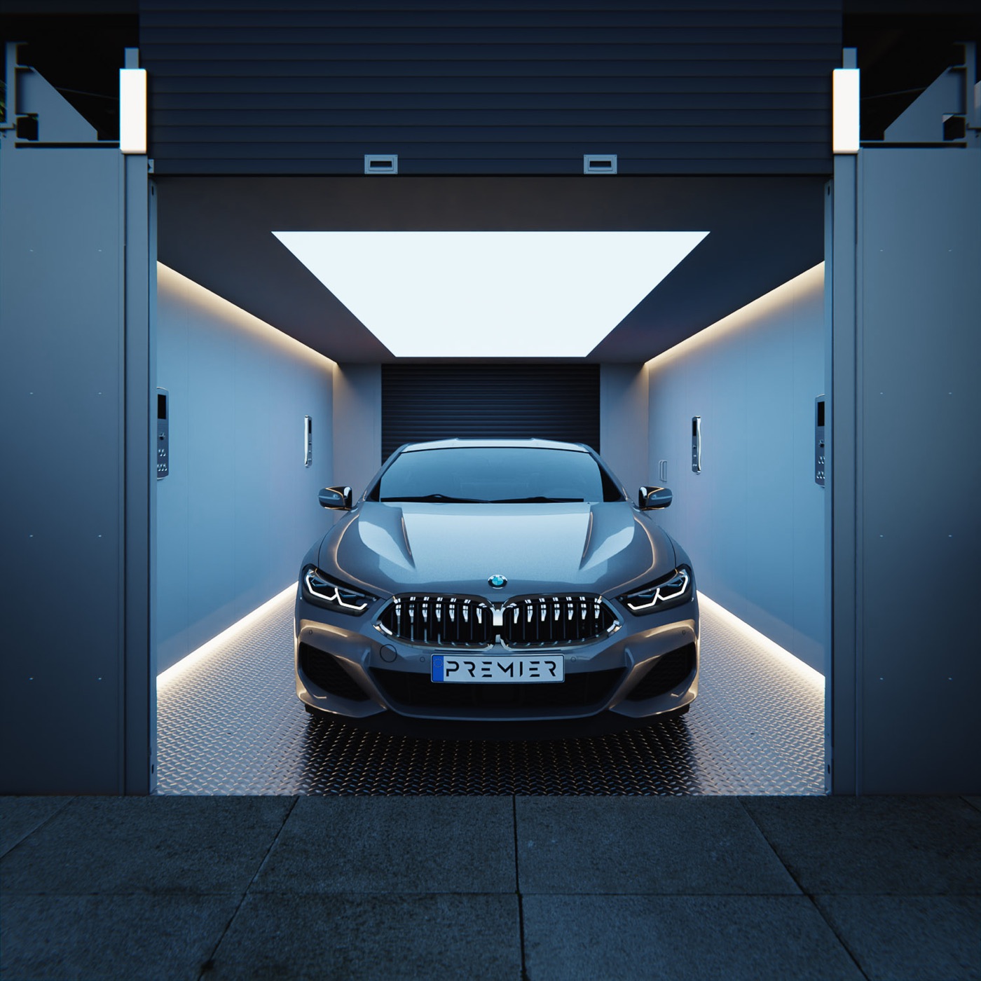 Vehicle lift lowering a car into a lit garage